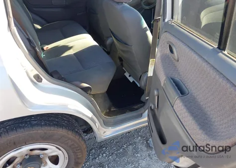 2000 Chevrolet Tracker Hard Top из США, поврежденный, VIN 2CNBE13CXY6911666